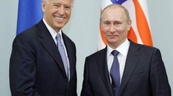 Joe Biden y Vladimir Putin en 2011
