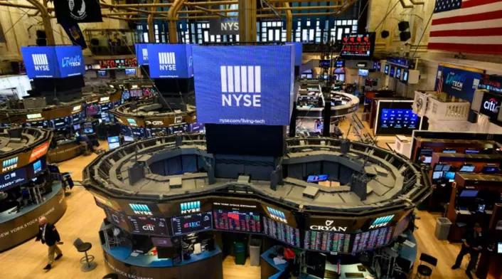 Corredores de bolsa en Wall Street