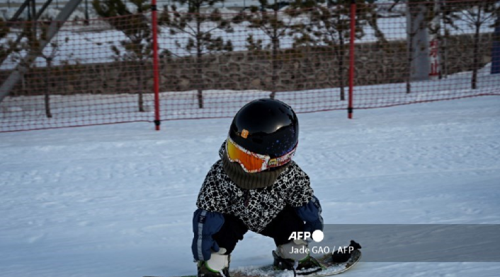 Wang Yuji en snowborad