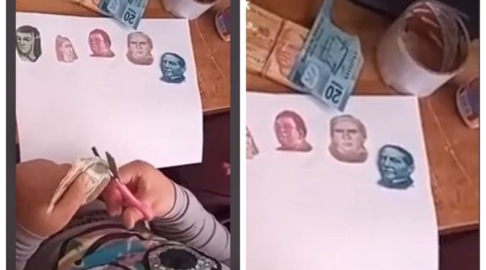 Niña cortando billetes Niña cortando billetes