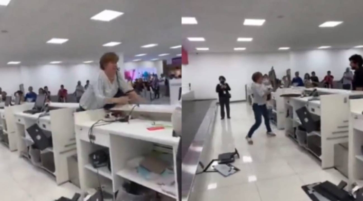 Mujer furiosa destrozó el mostrador de una aerolínea Mujer furiosa destrozó el mostrador de una aerolínea