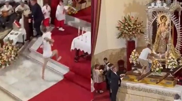 hombre interrumpió misa para subir a un niño al altar de la Virgen