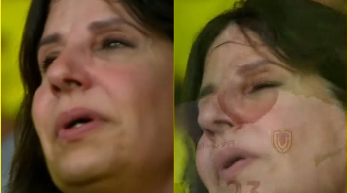 Mujer llora durante el himno de Venezuela