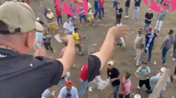 Hombre lanza dinero a corralejas Hombre lanza dinero a corralejas