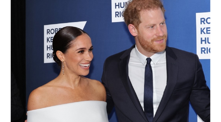 Meghan Markle y el príncipe Harry Video muestra a Meghan Markle apartando a una mujer que quería foto con el príncipe Harry