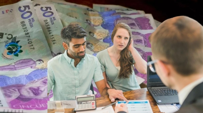 Vender propiedades hipotecadas Billetes al fondo y una pareja haciendo cuentas