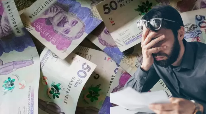Ley Borrón y Cuenta Nueva 2.0: requisitos Billetes al fondo y persona preocupada