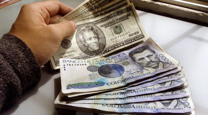 Pesos colombianos y dólares Pesos colombianos y dólares
