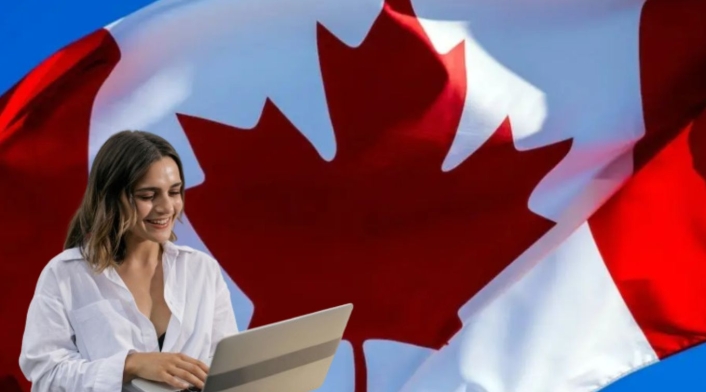 Empleo y residencia en Canadá Bandera de Canadá y mujer con portátil
