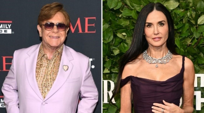 Elton John y Demi Moore Elton John y Demi Moore