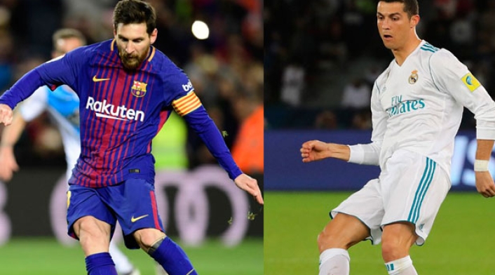 Messi-CR7-AFP.jpg