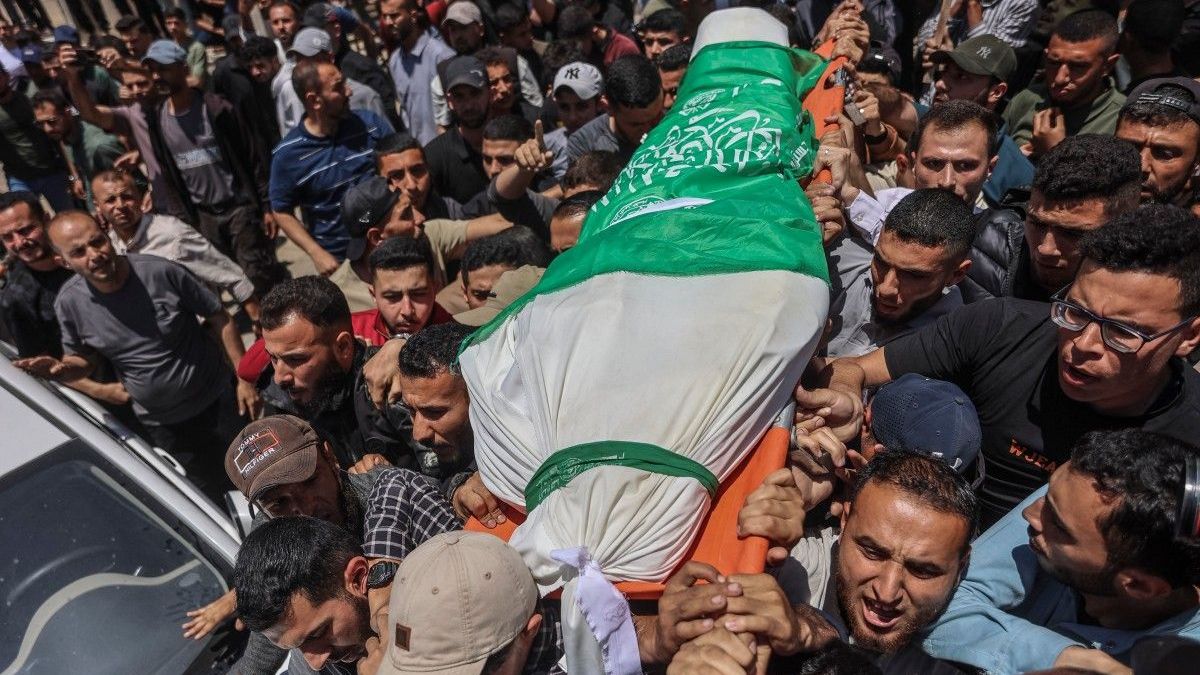 Dolientes se congregan antes del entierro del líder de Hamás, Mohammed Awda