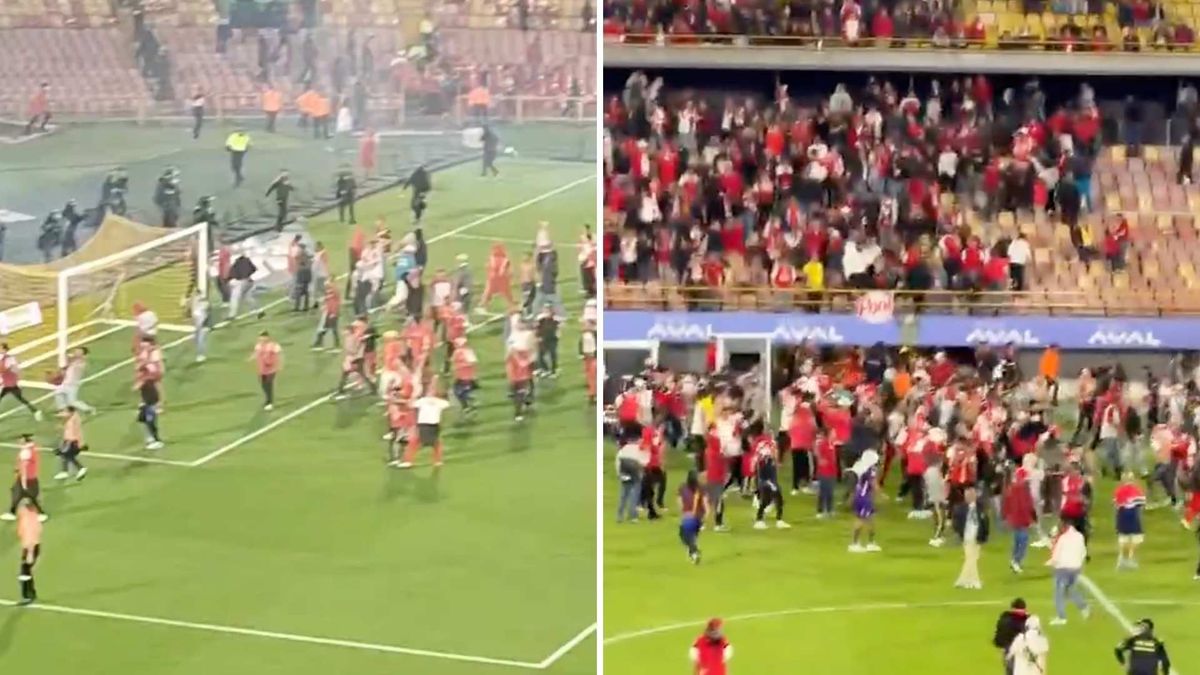 Los enfrentamientos entre hinchas obligaron a suspender temporalmente el partido entre Santa Fe y América en El Campín.